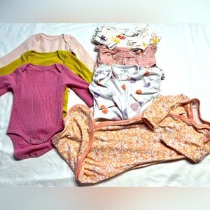 0-3 mos and 3 mos long sleeve onesies, 3 are footed and 1 long gown tie bottom.